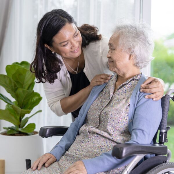 woman hugging elderly mother