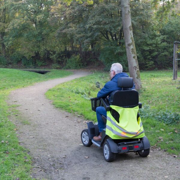 man using a mobility scooter outside