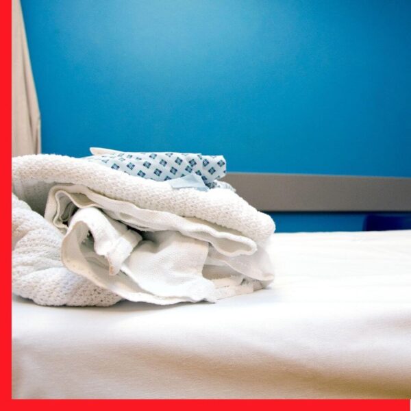 hospital bed with linens