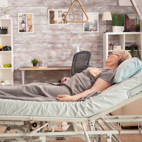 image of a woman in a home hospital bed
