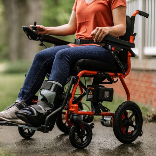 image of a woman in a power wheelchair